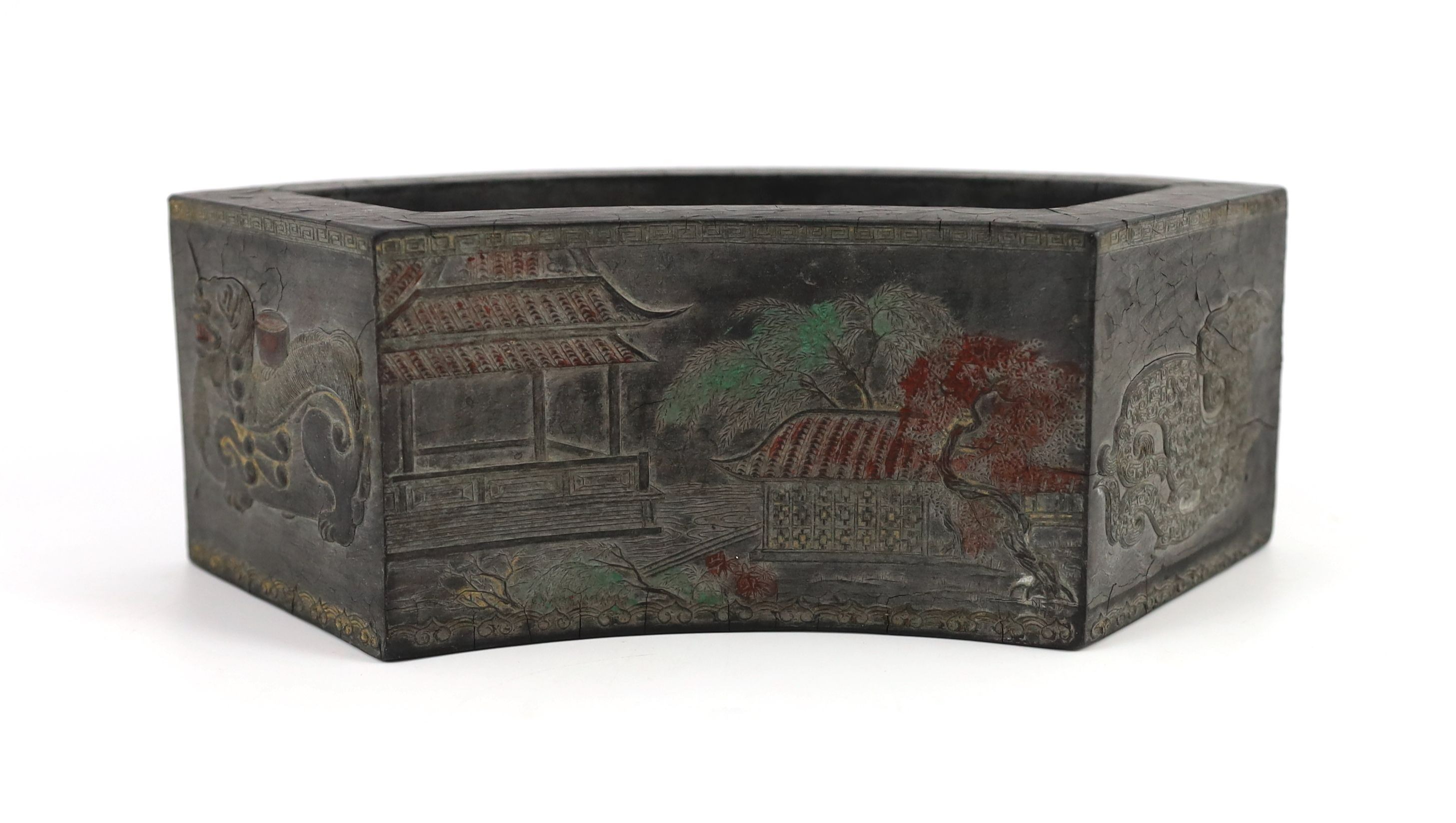 A Chinese compressed ink block in the form of a flower pot, Ming mark, Qing dynasty, 25 cm wide